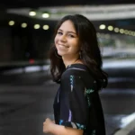 Life transitions therapy NYC, Manhattan, Brooklyn, woman, smiling, standing, counseling, Queens, therapist, happy, confident