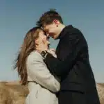 Intimate moment between partners sharing smiles after successful sessions with marriage counselors in NYC who specialize in emotional healing.