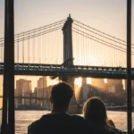 Couple with bridge: Relationship issues therapy NYC, Manhattan, Brooklyn, couple, bridge, cityscape, counseling, Queens, therapist, connection, urban