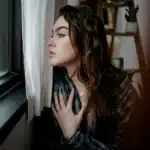  Low self-esteem therapy NYC, Manhattan, Brooklyn, woman, window, outside, counseling, Queens, therapist, reflection, peaceful