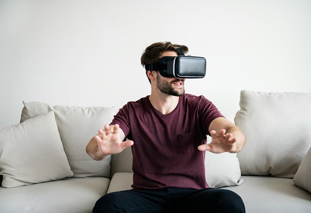 White man enjoying a virtual reality experience